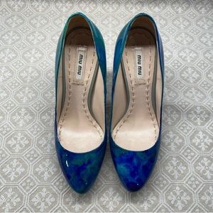 ISO blue green patent miu miu round toe high heels